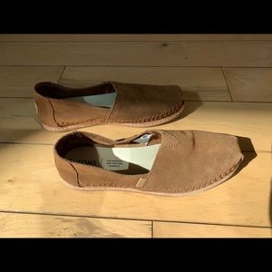 Toms size 7.5 brown slip on shoes.